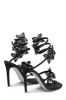 Crystal-Embellished Flower Snake Wrap Stiletto Sandals - Black sold by Floralkini