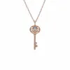 Rose Gold Plated Sterling Silver Aquamarine Big Key Charm sold by Gemondo Jewellery