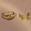 ECFEW™ 'The Liberator' Peridot Heart Stud Earrings in 9ct Yellow Gold sold by Gemondo Jewellery