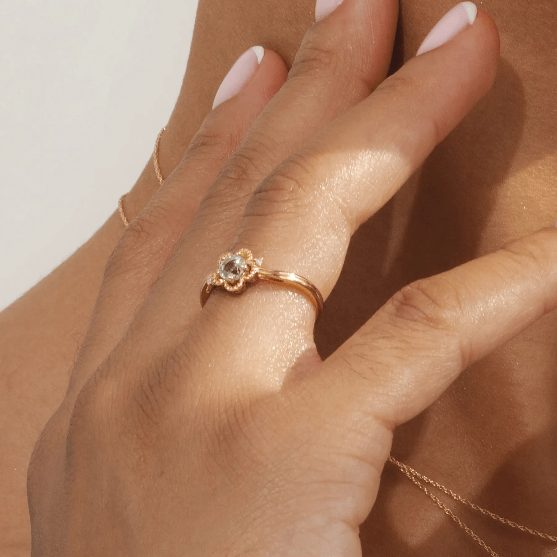 Floral Round Blue Topaz & Diamond Ring in 9ct Yellow Gold sold by Gemondo Jewellery product image thumbnail 2