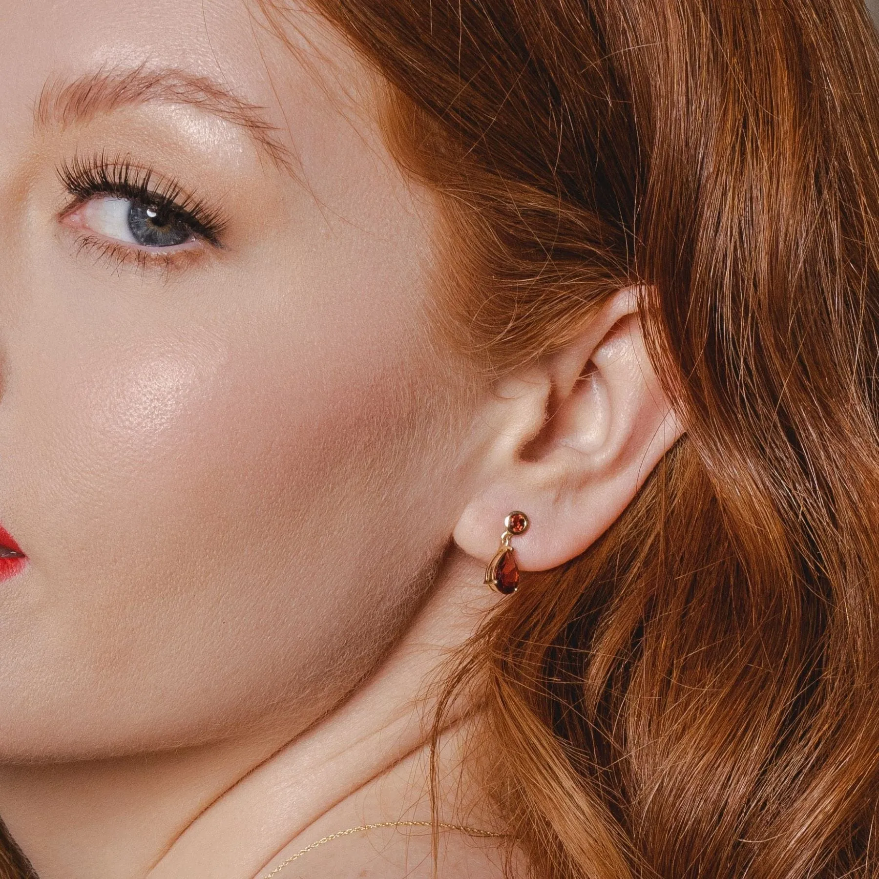 Classic Pear Garnet Drop Earrings in 9ct Yellow Gold sold by Gemondo Jewellery product image thumbnail 2