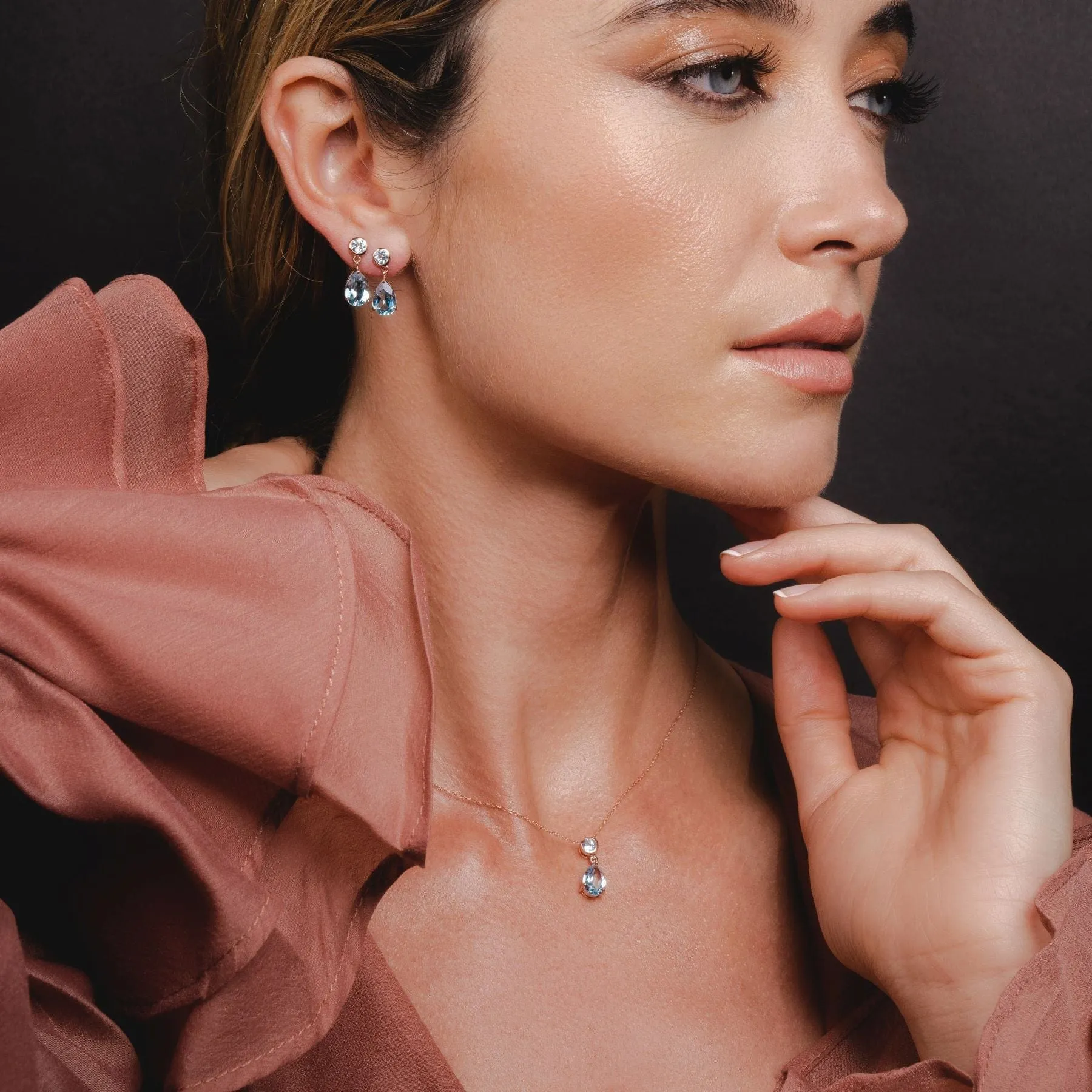 Classic Pear Blue Topaz Drop Earrings in 9ct Rose Gold sold by Gemondo Jewellery product image thumbnail 2