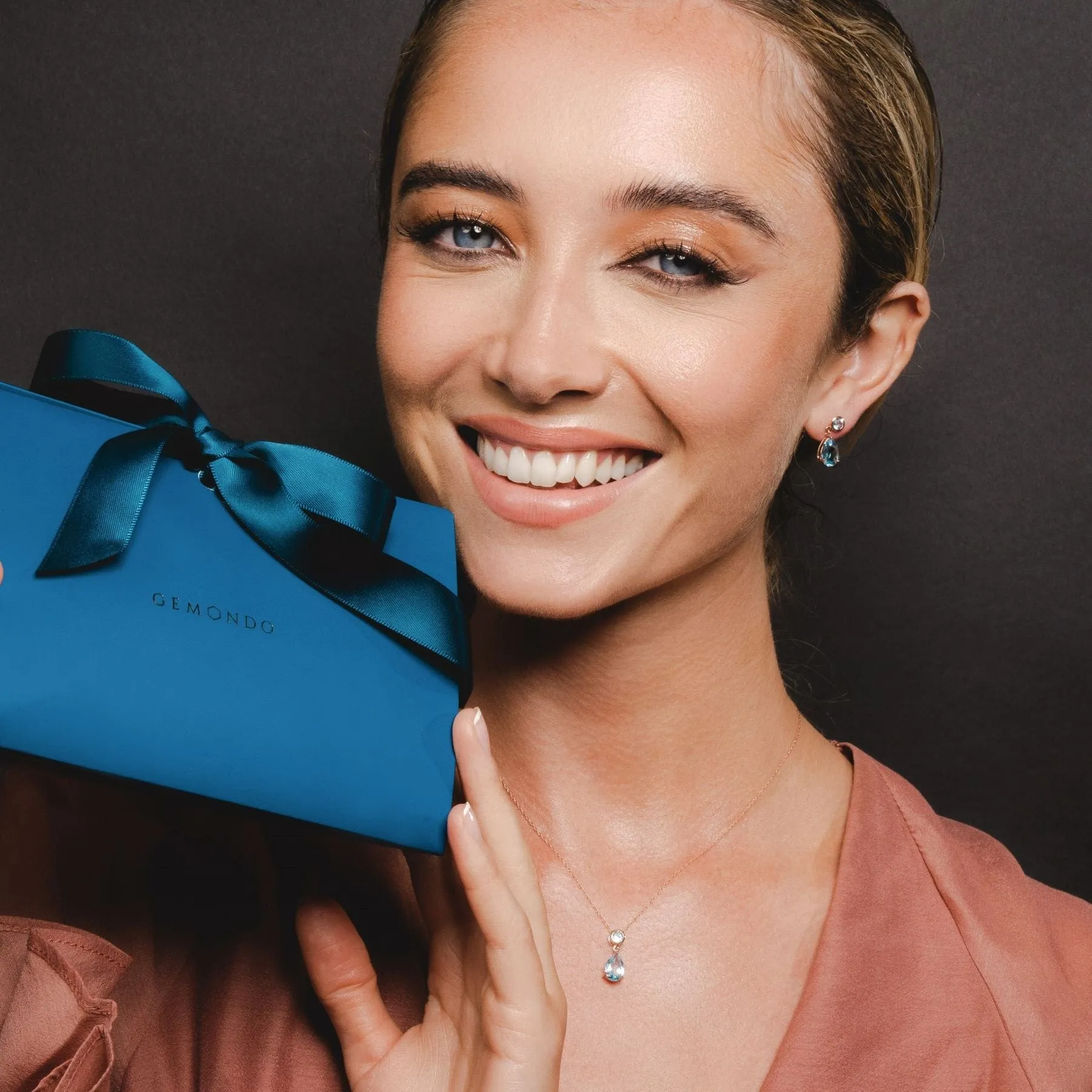 Classic Pear Blue Topaz Drop Earrings in 9ct Rose Gold sold by Gemondo Jewellery product image thumbnail 3