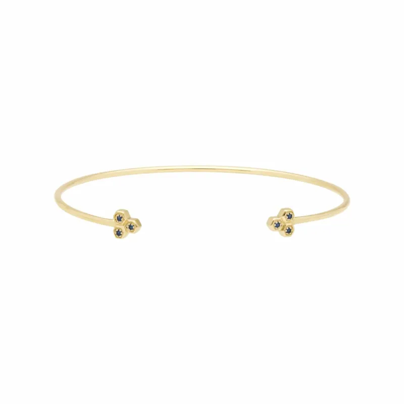 Sapphire Trilogy Geometric Bangle in 9ct Yellow Gold sold by Gemondo Jewellery