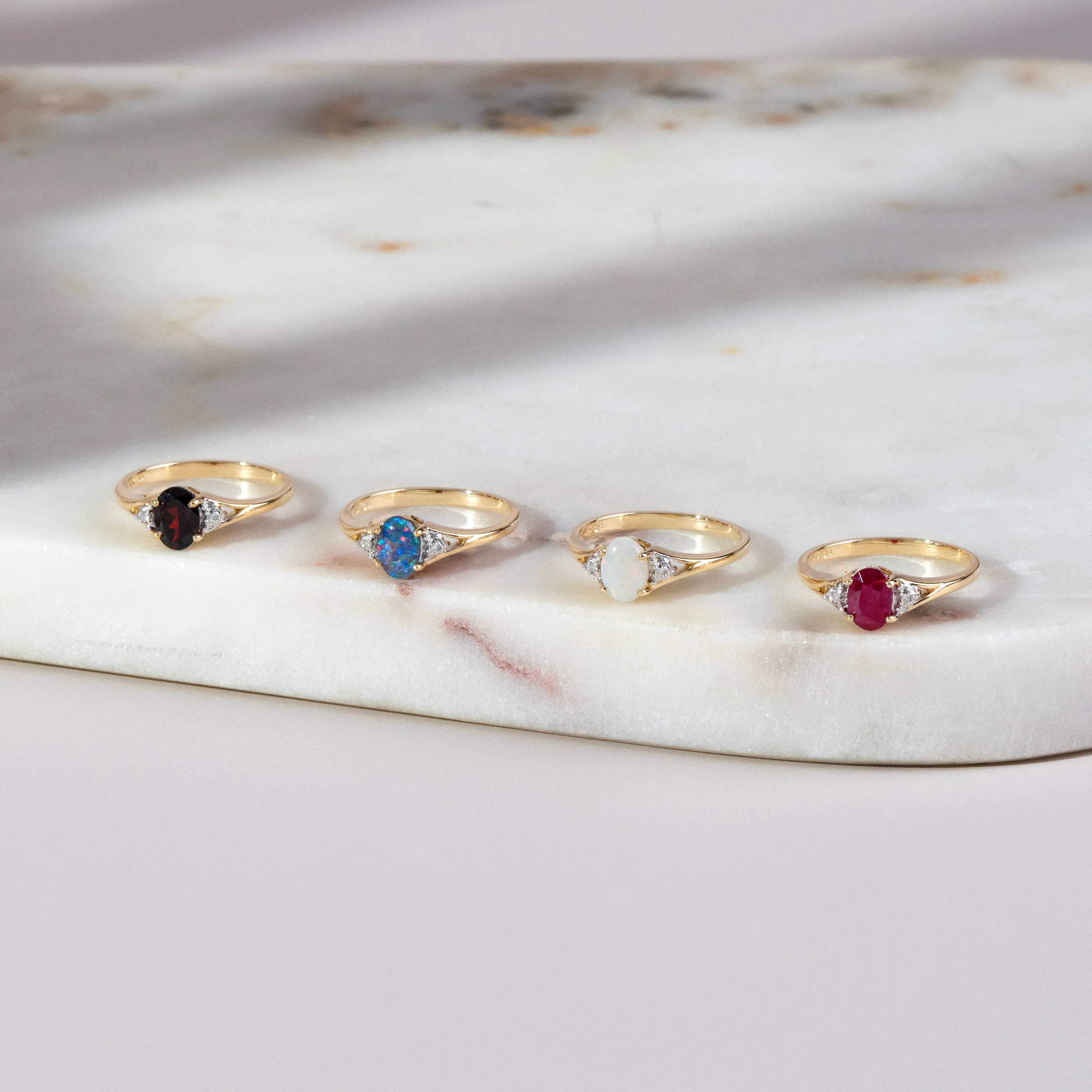 Classic Oval Garnet & Diamond Ring in 9ct Yellow Gold sold by Gemondo Jewellery product image thumbnail 2