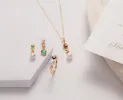 Modern Pearl, Emerald & Topaz Mismatched Drop Earrings in Gold Plated Silver sold by Gemondo Jewellery