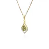Classic Pear Peridot & Diamond Leaf Halo Pendant in 9ct Yellow Gold sold by Gemondo Jewellery