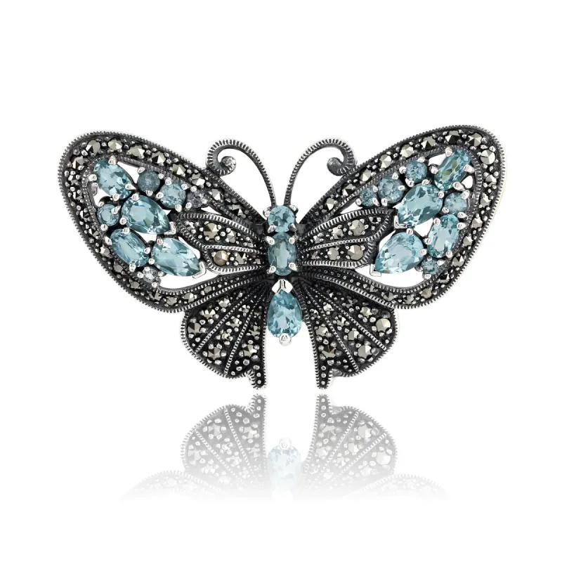 Art Nouveau Style Marquise Blue Topaz & Marcasite Butterfly Brooch in 925 Sterling Silver sold by Gemondo Jewellery