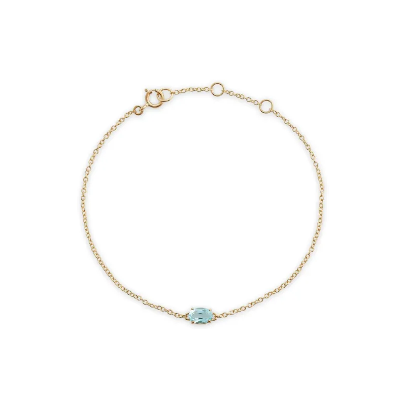 Classic Oval Blue Topaz Single Stone Bracelet in 9ct Yellow Gold sold by Gemondo Jewellery