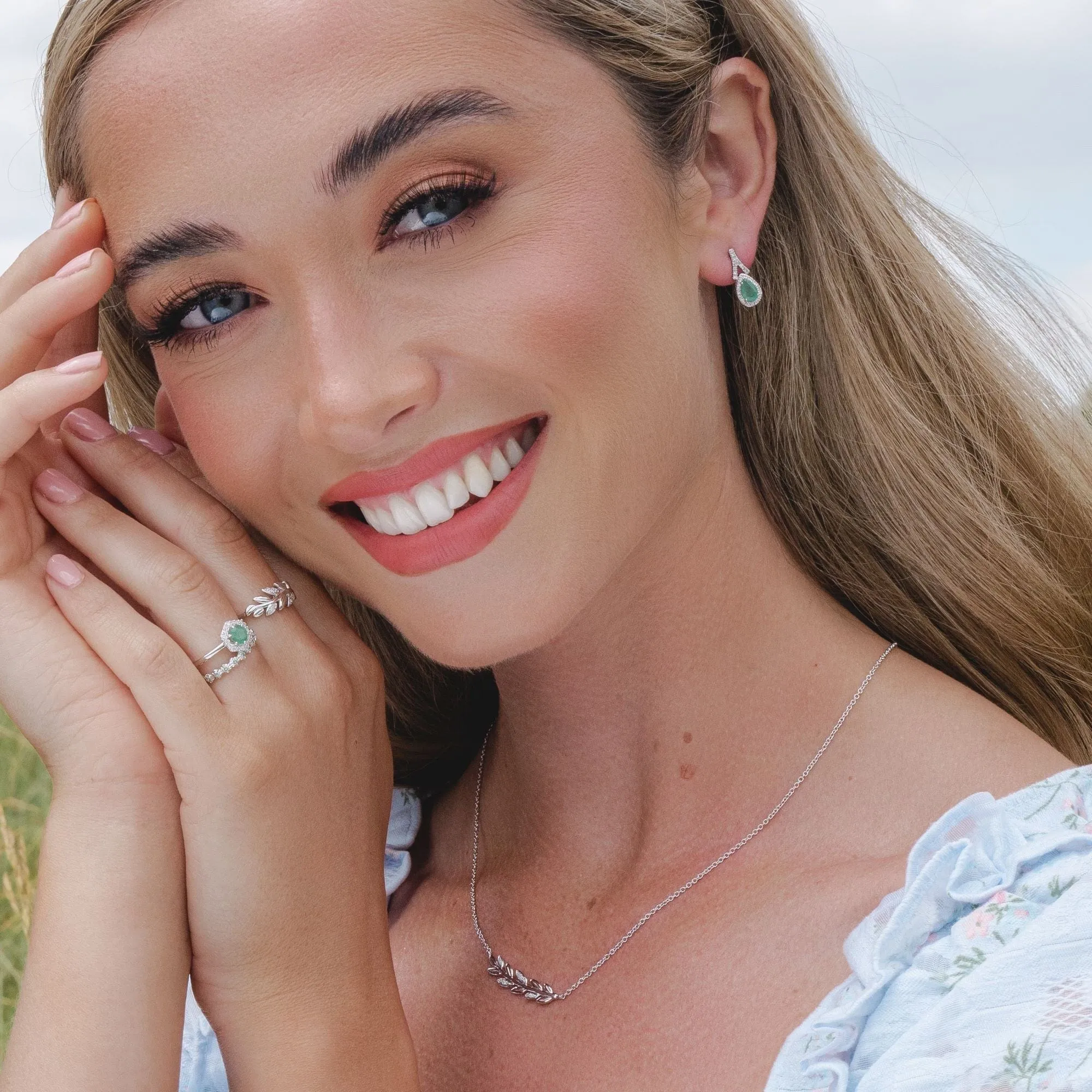 9ct White Gold 0.67ct Emerald & Diamond Halo Ring sold by Gemondo Jewellery product image thumbnail 3