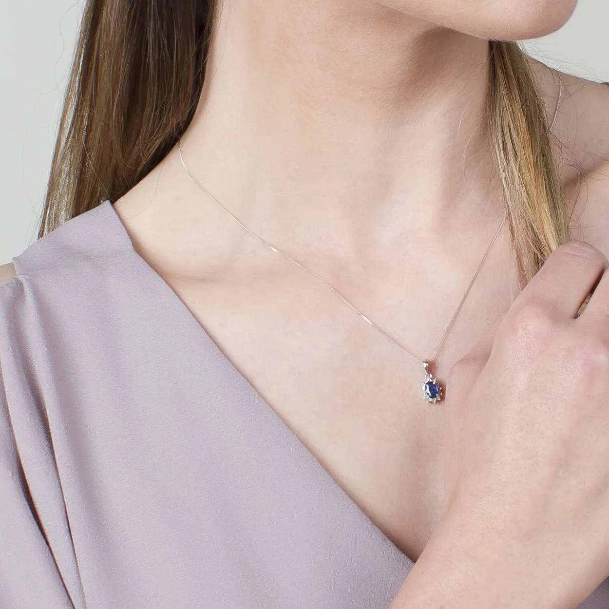 Classic Oval Sapphire & Diamond Cluster Pendant in 9ct White Gold sold by Gemondo Jewellery product image thumbnail 2