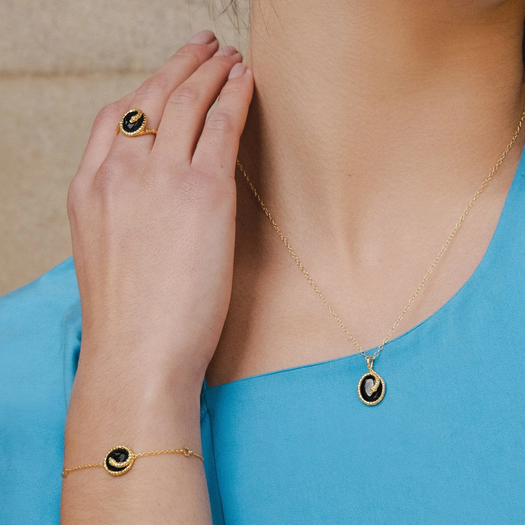 ECFEW™ Oval Onyx Winding Snake Pendant Necklace in Gold Plated Sterling Silver sold by Gemondo Jewellery product image thumbnail 2