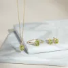Classic Oval Peridot & Diamond Heart Stud Earrings In 9ct Yellow Gold sold by Gemondo Jewellery