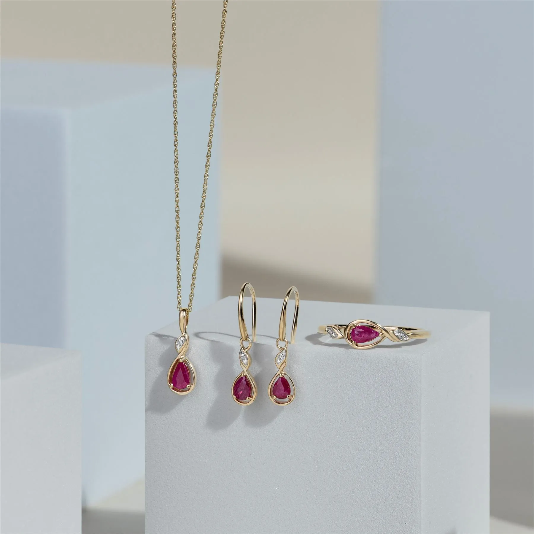 Classic Pear Ruby & Diamond Drop Earrings In 9ct Yellow Gold sold by Gemondo Jewellery product image thumbnail 5