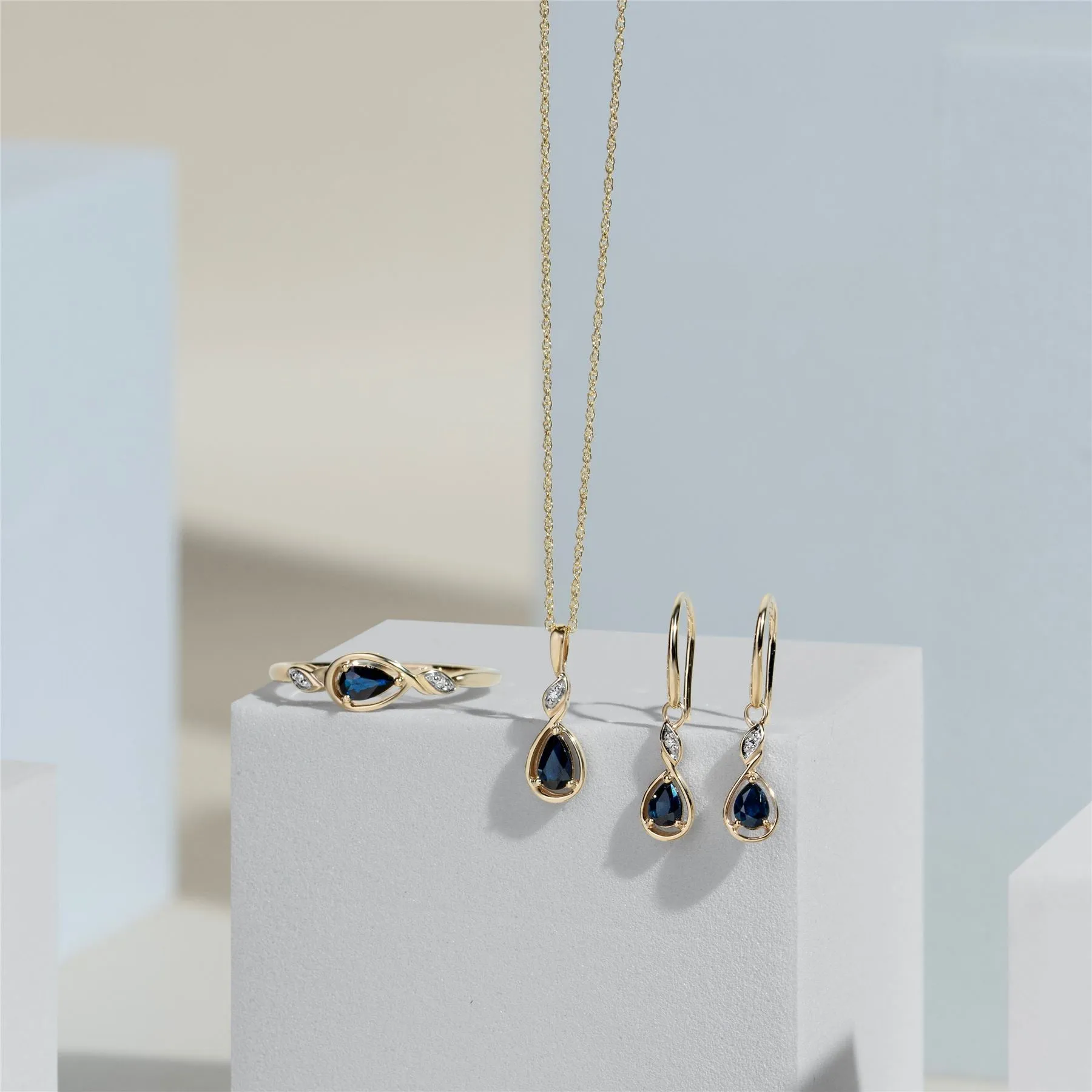 Classic Pear Sapphire & Diamond Pendant Necklace In 9ct Yellow Gold sold by Gemondo Jewellery product image thumbnail 4