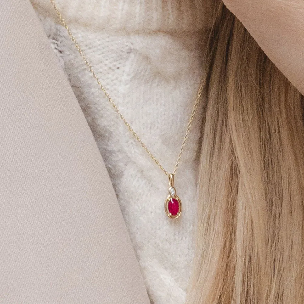 Classic Oval Ruby & Round Diamond Pendant Necklace In 9ct Yellow Gold sold by Gemondo Jewellery product image thumbnail 2