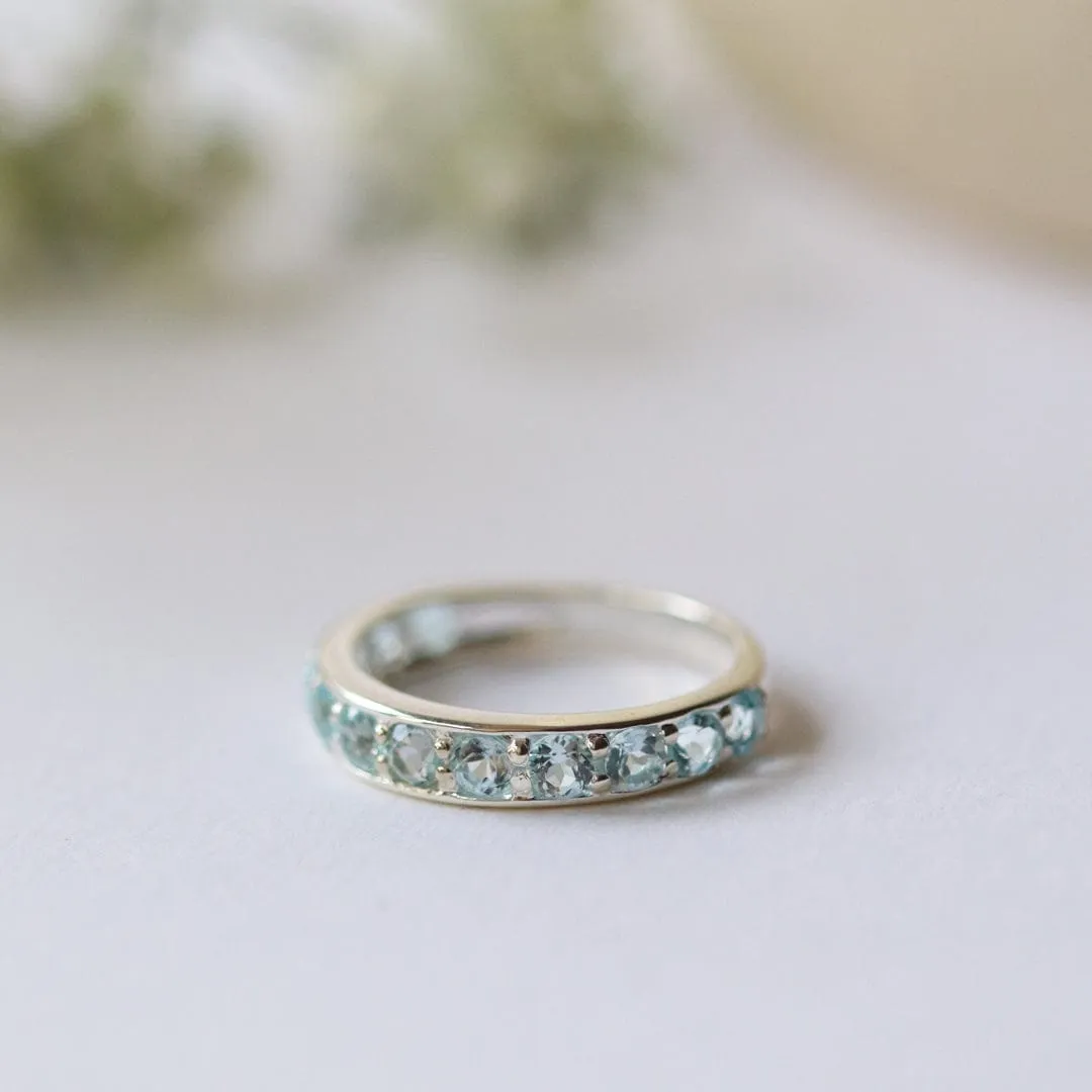 Classic Round Blue Topaz Half Eternity Ring in 925 Sterling Silver sold by Gemondo Jewellery product image thumbnail 2