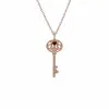 Rose Gold Plated Sterling Silver Garnet Big Key Charm sold by Gemondo Jewellery