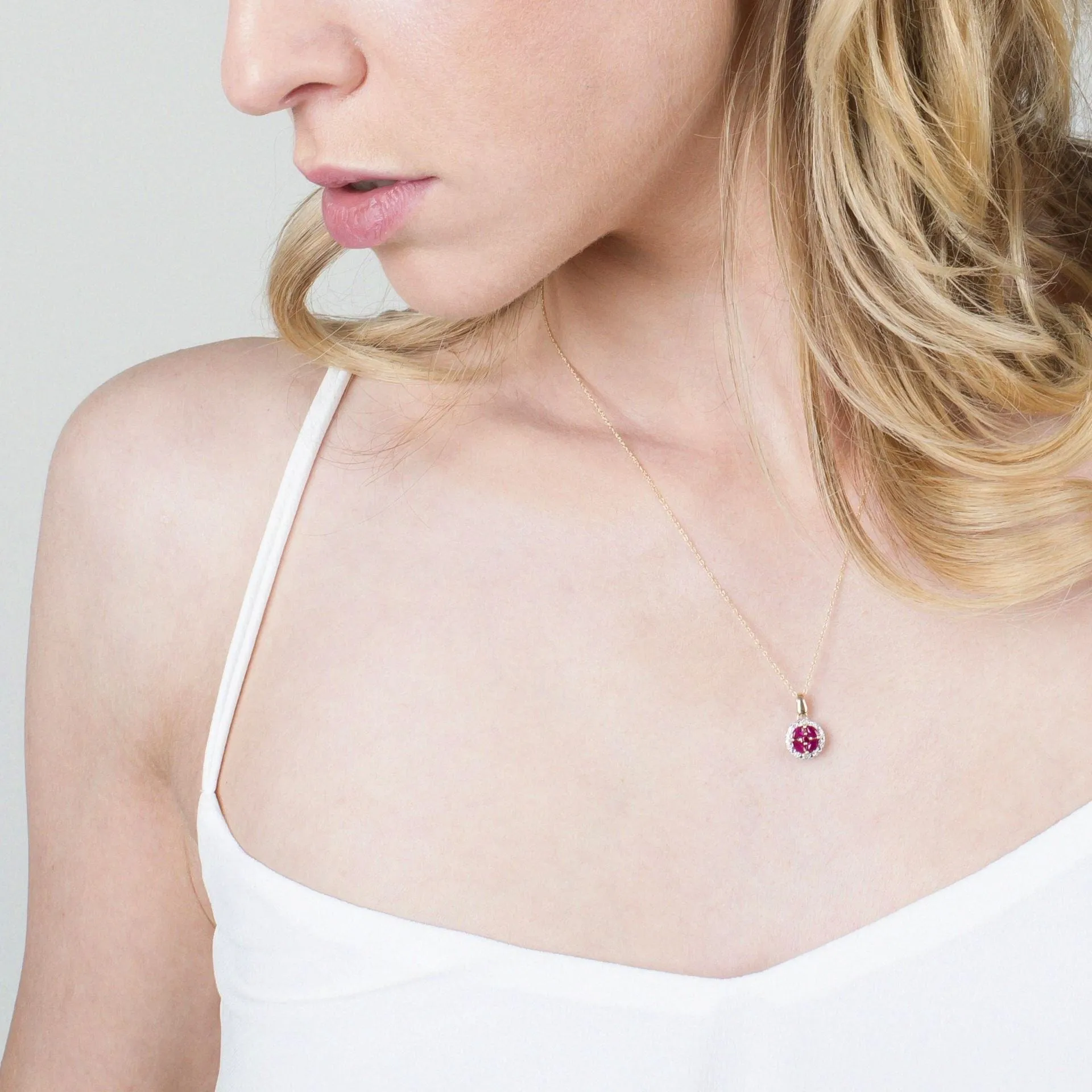 Classic Marquise Ruby & Diamond Halo Cluster Pendant in 9ct Yellow Gold sold by Gemondo Jewellery product image thumbnail 3