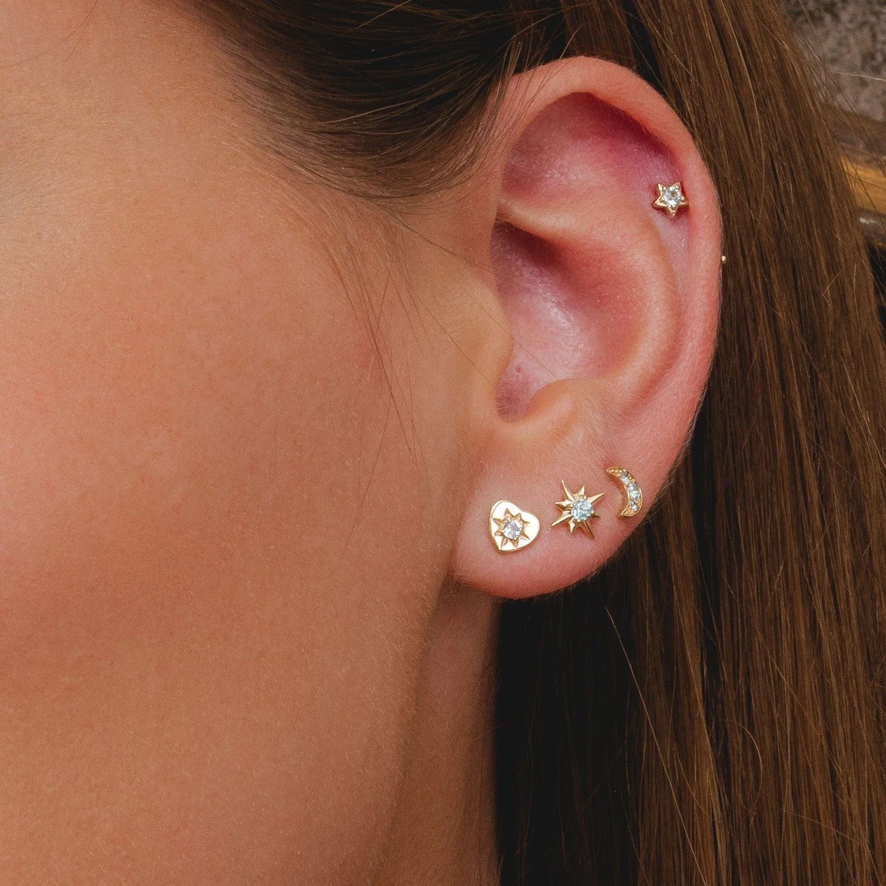 ECFEW™ 'The Liberator' Blue Topaz Heart Stud Earrings in 9ct Yellow Gold sold by Gemondo Jewellery product image thumbnail 2