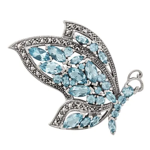 Art Nouveau Style Marquise Blue Topaz & Marcasite Flying Butterfly Brooch in 925 Sterling Silver sold by Gemondo Jewellery