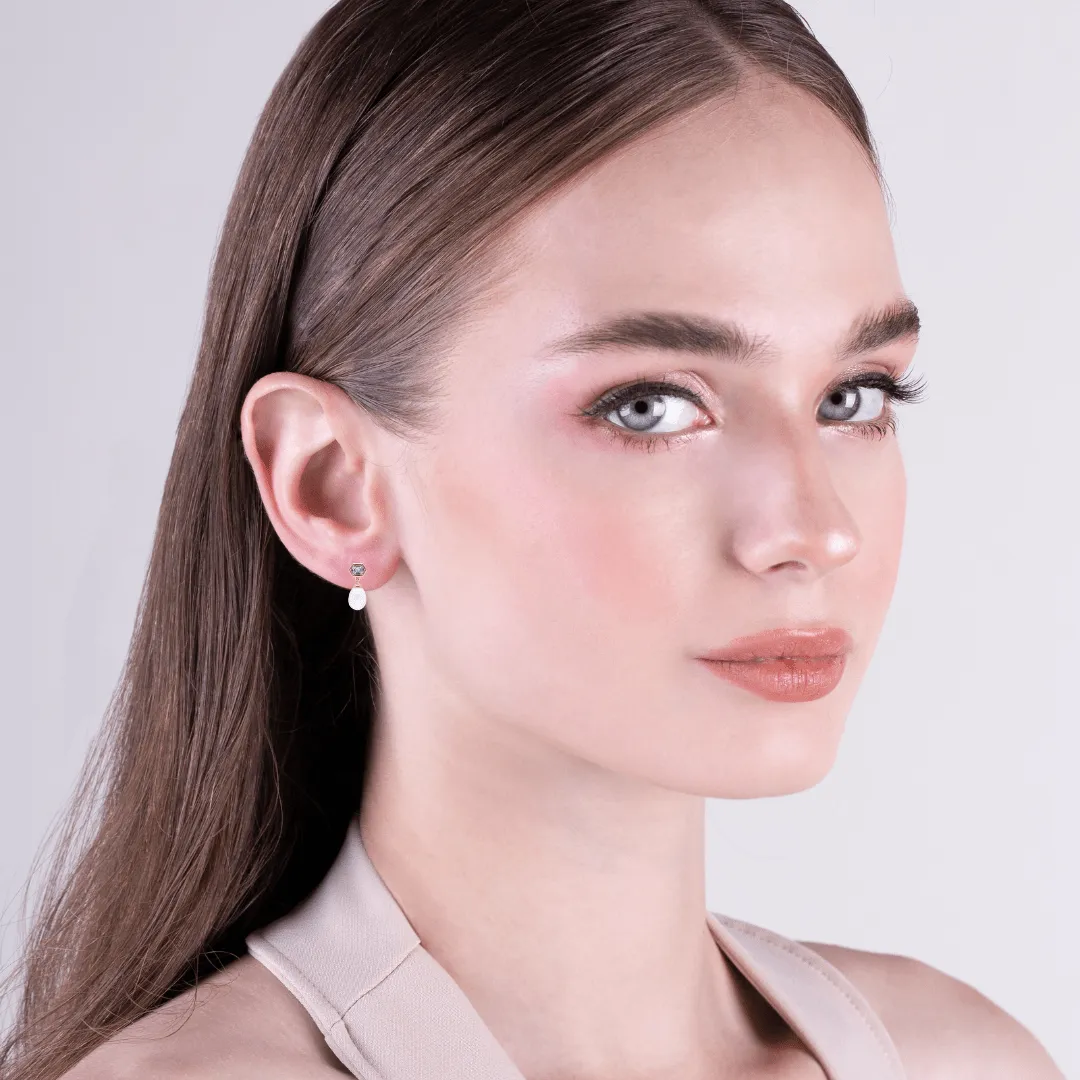 Modern Pearl & Blue Topaz Mismatched Drop Earrings in Gold Plated Silver sold by Gemondo Jewellery product image thumbnail 2