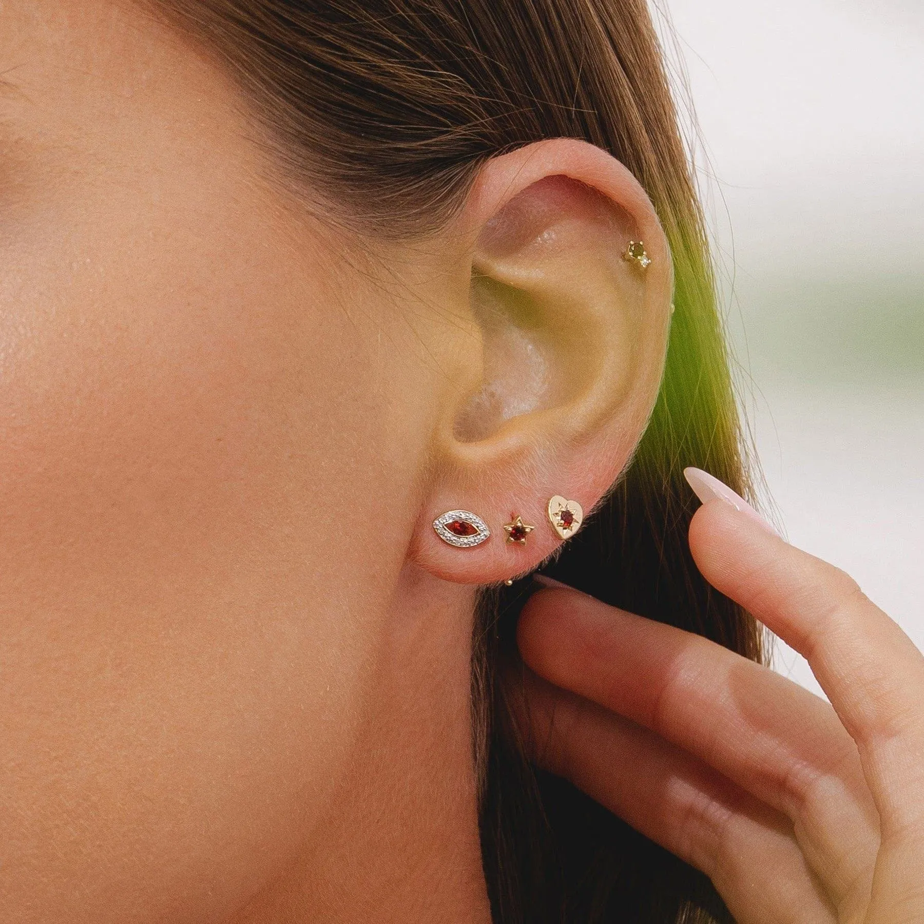 ECFEW™ Dainty Evil Eye Garnet Stud Earrings in 9ct Yellow Gold sold by Gemondo Jewellery product image thumbnail 2