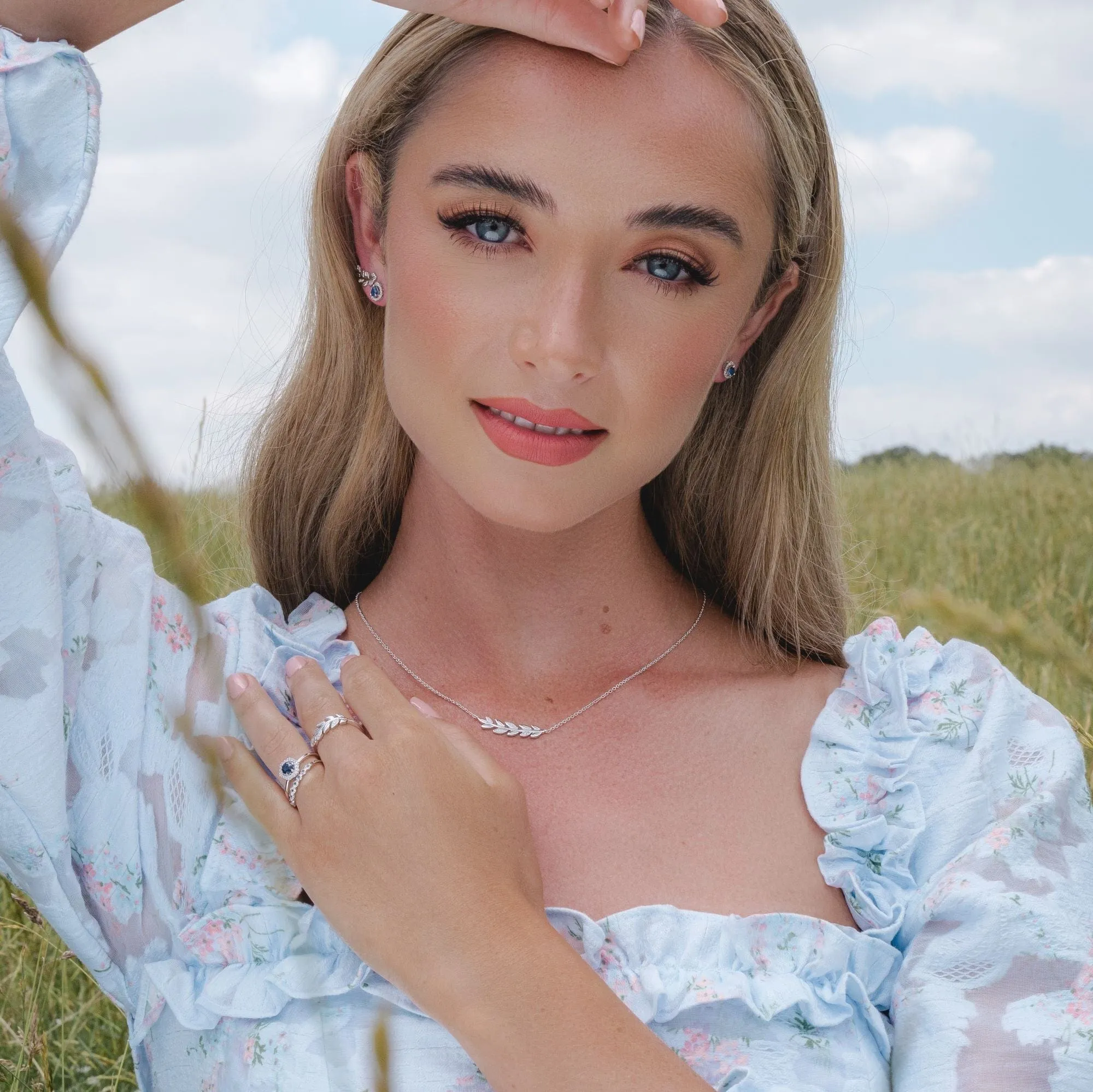 9ct White Gold 0.92ct Sapphire & Diamonds Halo Ring sold by Gemondo Jewellery product image thumbnail 2