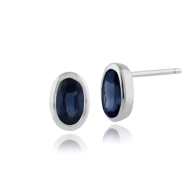 Classic Oval Light Blue Sapphire Stud Earrings in 9ct White Gold 6x4mm sold by Gemondo Jewellery