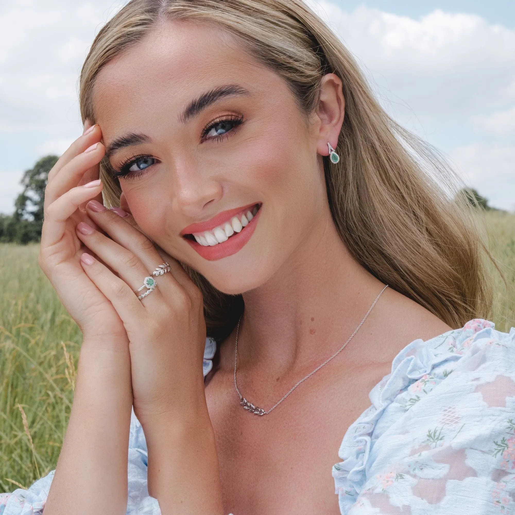 9ct White Gold 0.38ct Emerald & Diamond Halo Ring sold by Gemondo Jewellery product image thumbnail 3