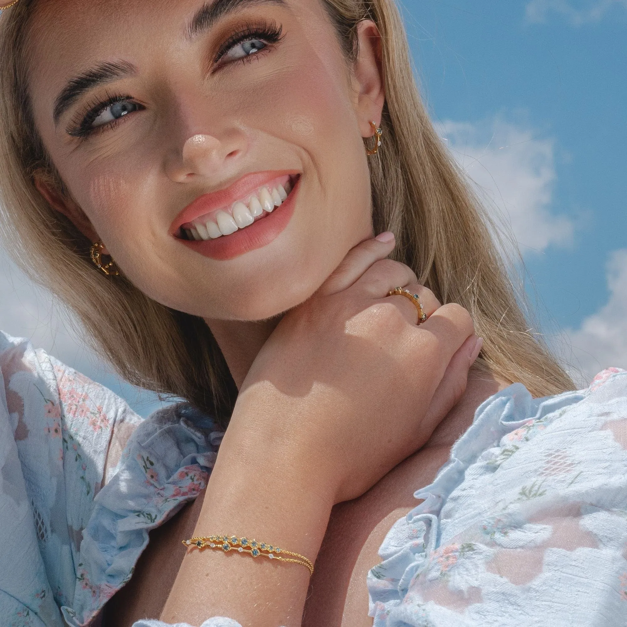 Modern Glam Topaz Mini Hoop Earrings in Gold Plated Sterling Silver sold by Gemondo Jewellery product image thumbnail 3