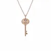 Rose Gold Plated Sterling Silver Opal Big Key Charm sold by Gemondo Jewellery