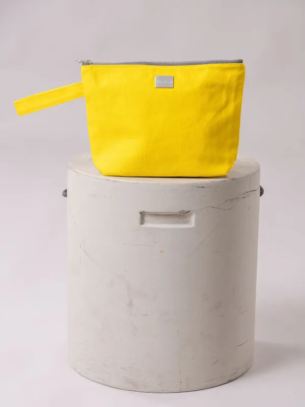 WATER toiletry bag, yellow sun sold by Globe Hope