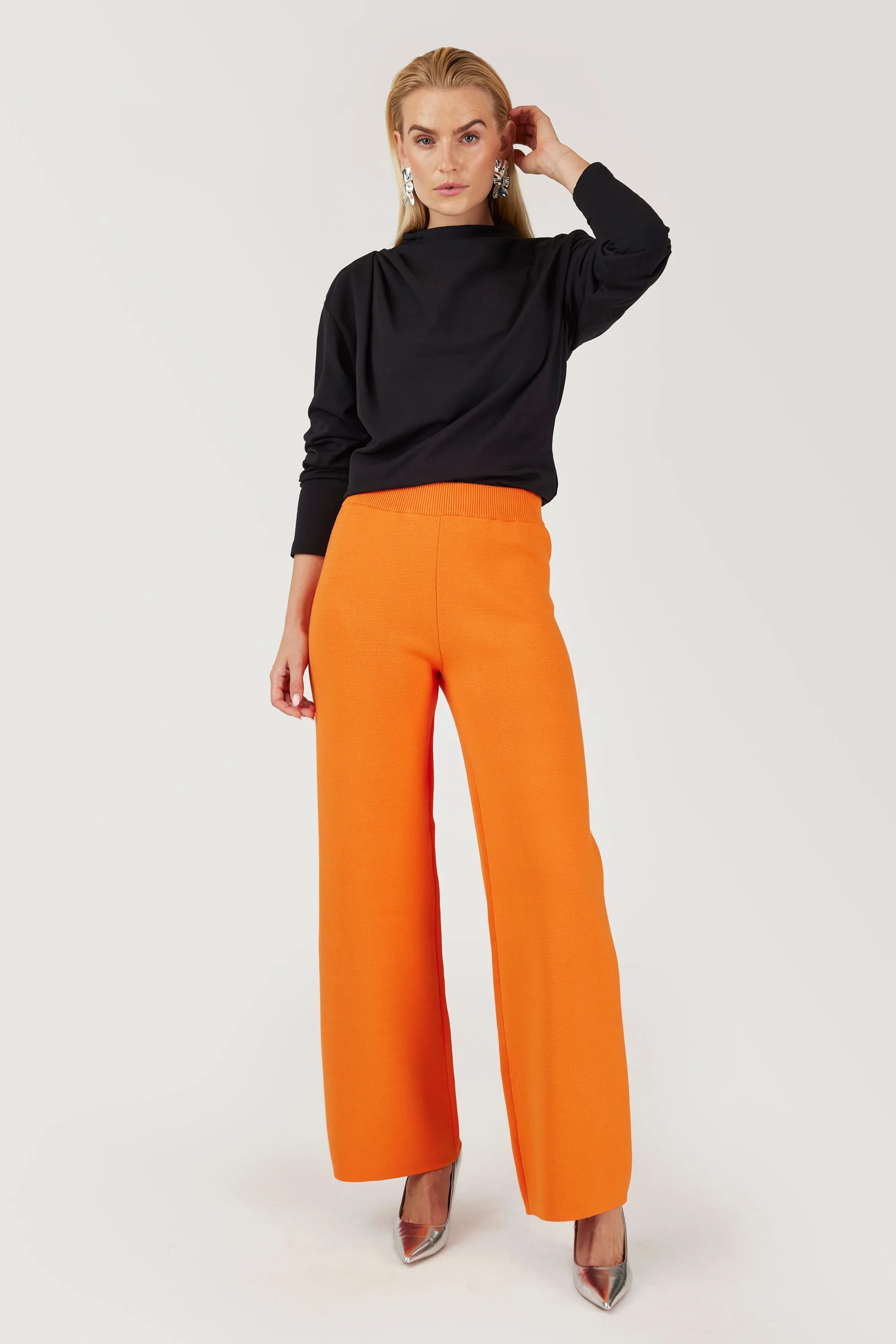 GOMAYE GMSONNY REGULAR KNITWARE TROUSERS ORANGE sold by Gomaye
