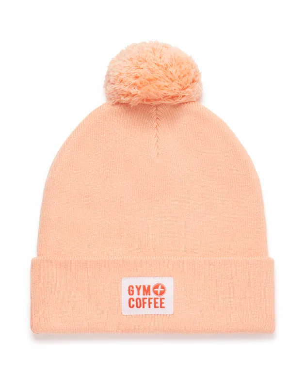 Knit Bobble Beanie in Sunrise Peach sold by Gym+Coffee