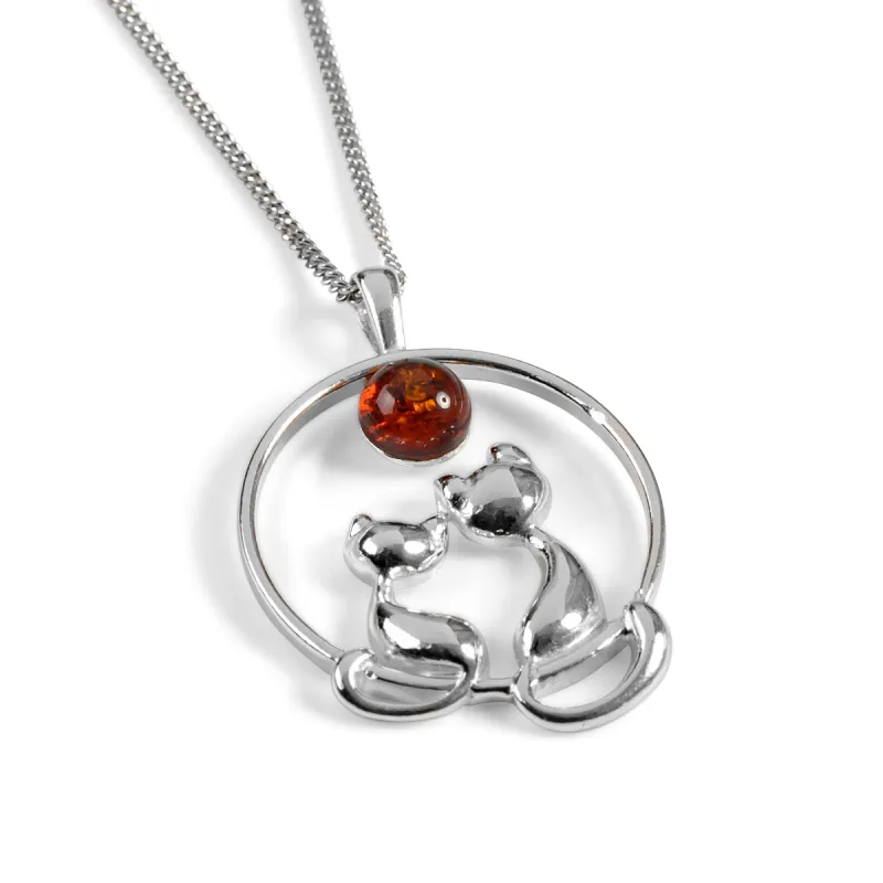 Cuddling Cats Necklace in Silver and Amber sold by Henryka