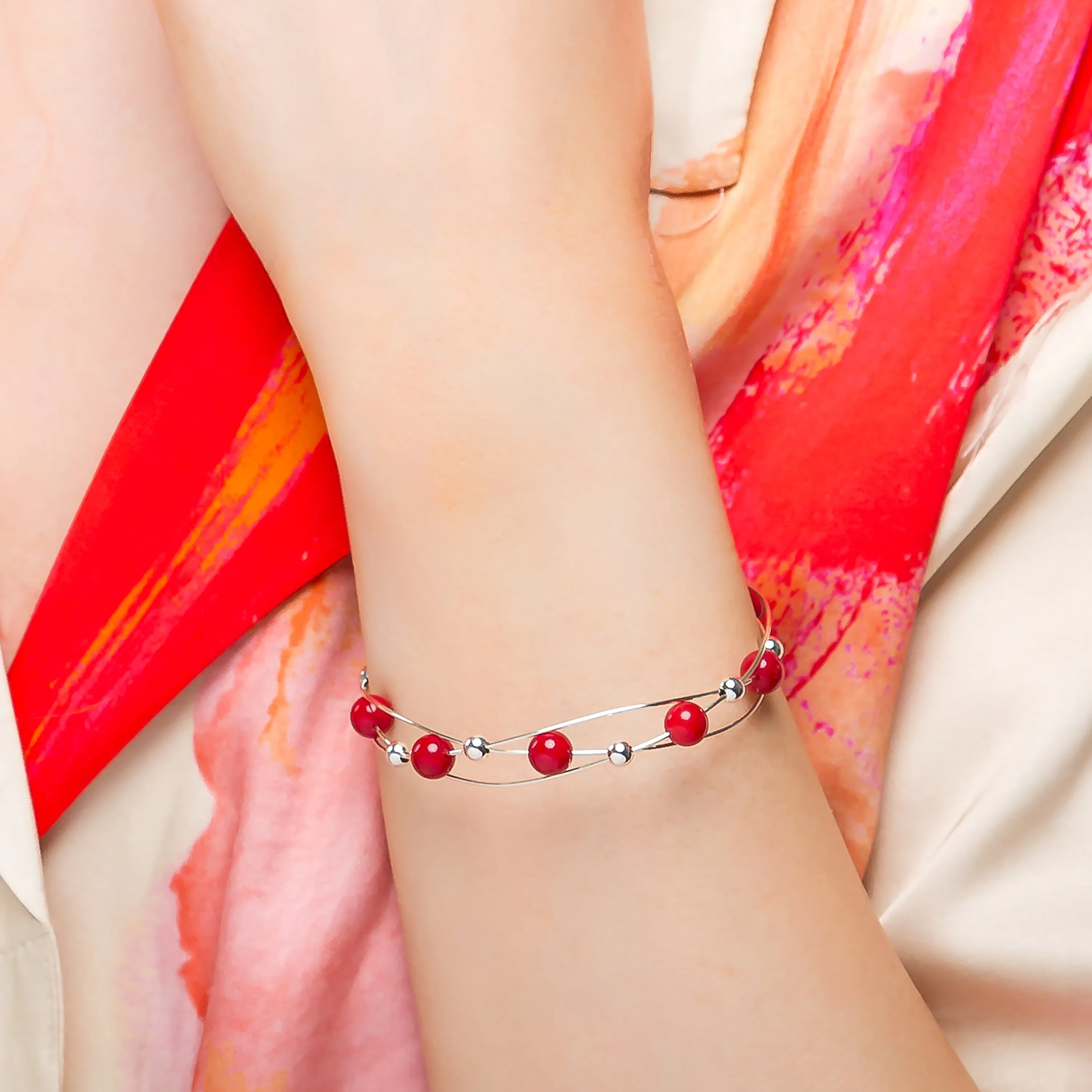 Weaved Bangle in Silver and Coral sold by Henryka product image thumbnail 2