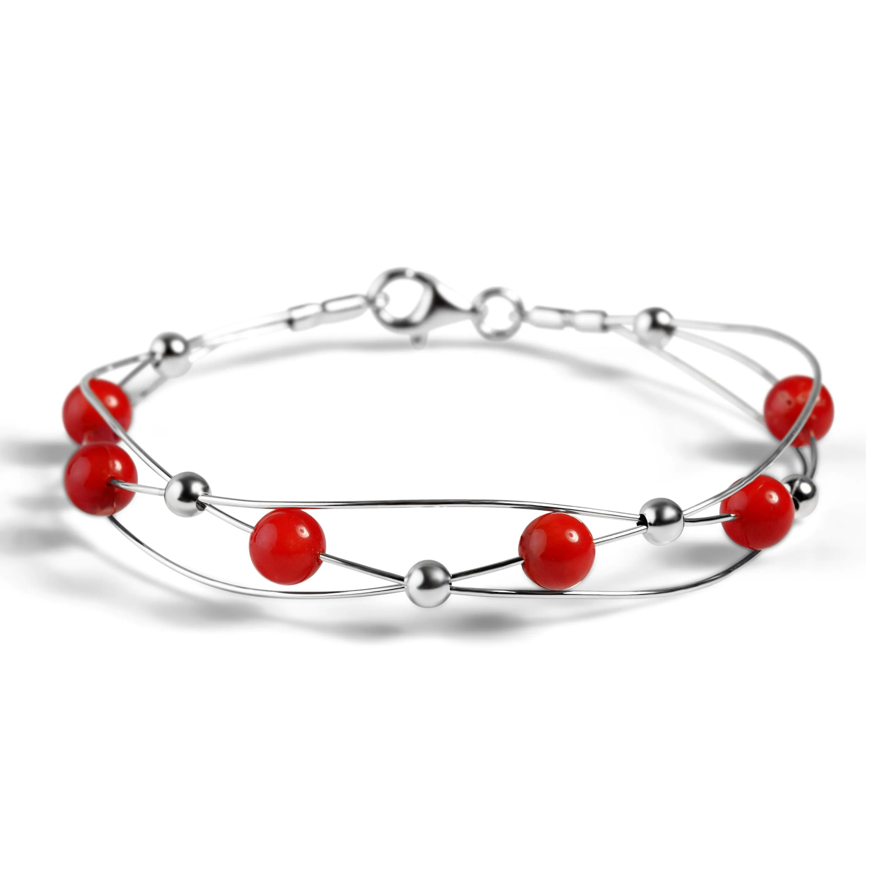 Weaved Bangle in Silver and Coral sold by Henryka