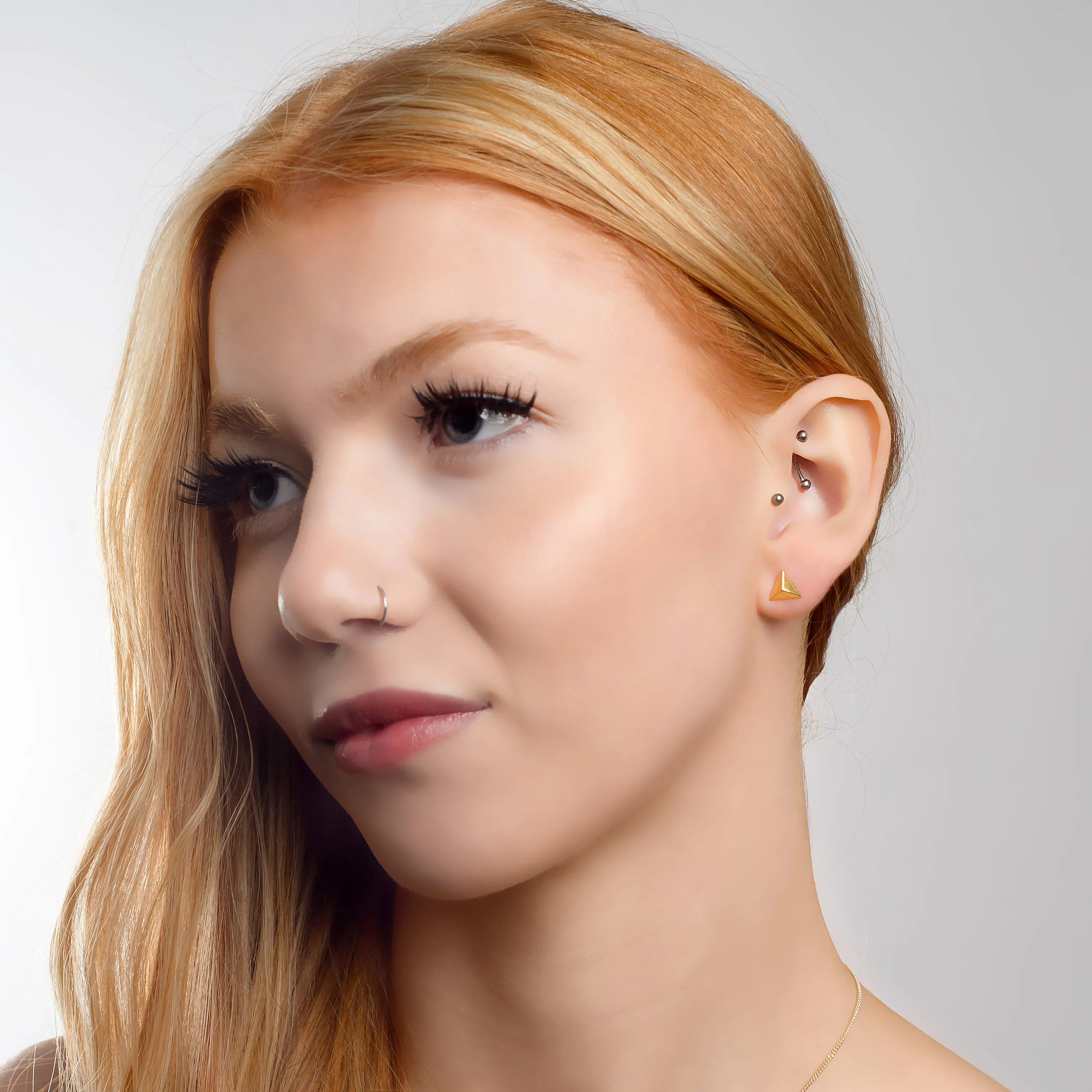 Geometric Triangle Stud Earrings in Silver with 24ct Gold sold by Henryka product image thumbnail 3