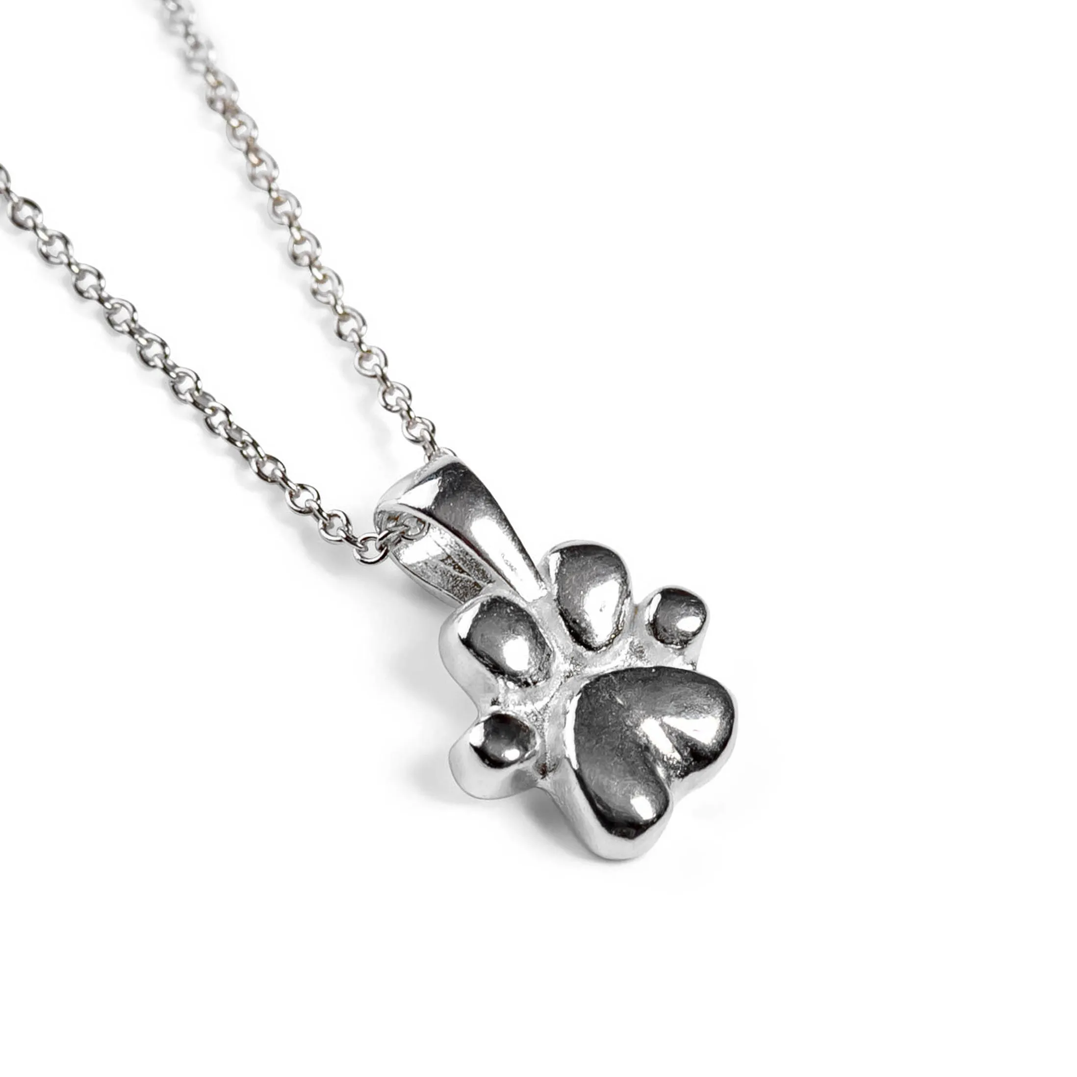Miniature Paw Print Necklace in Silver sold by Henryka