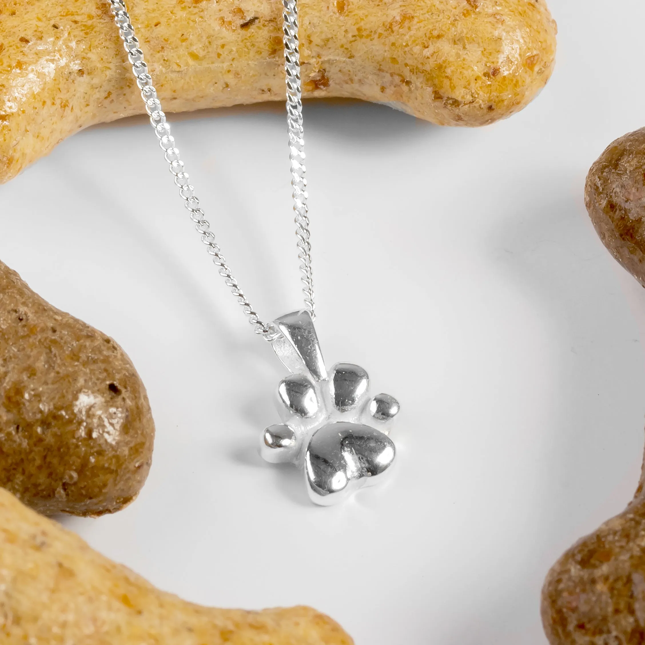 Miniature Paw Print Necklace in Silver sold by Henryka product image thumbnail 4