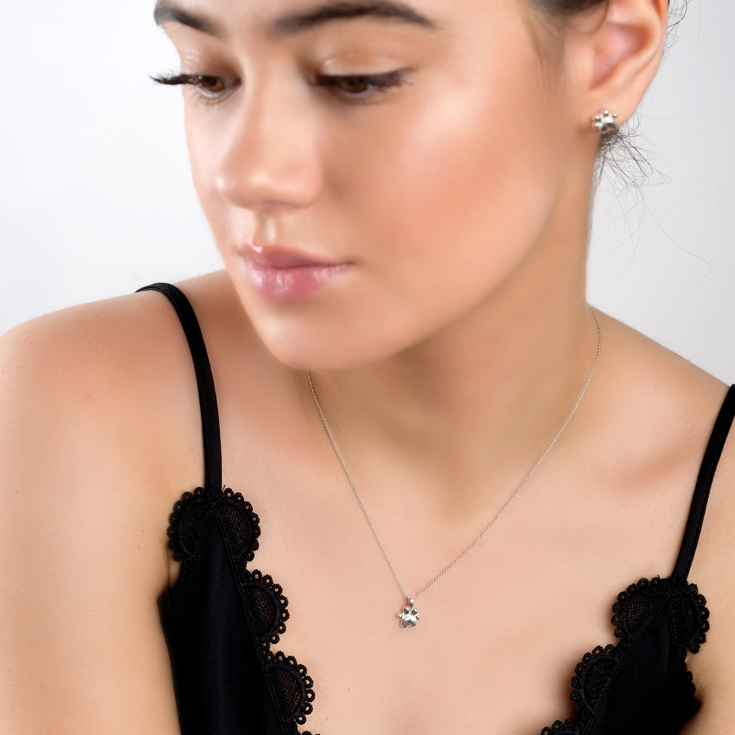 Miniature Paw Print Necklace in Silver sold by Henryka product image thumbnail 3