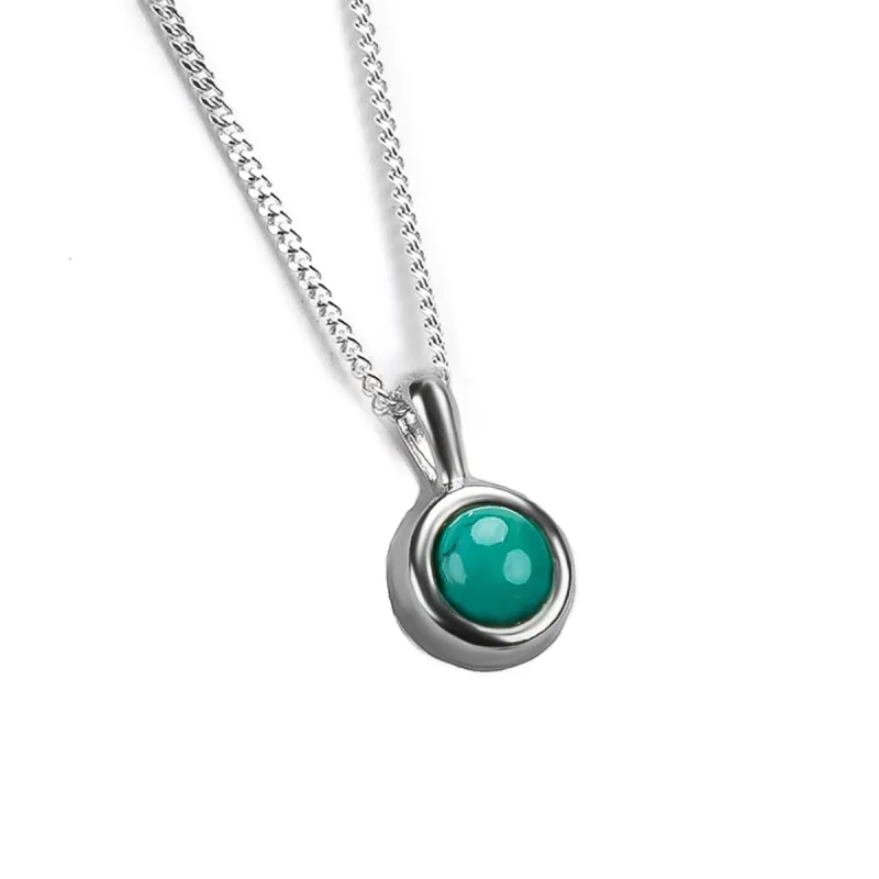 Round Charm Necklace in Silver and Natural Turquoise sold by Henryka