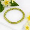 Stretch Bead Bracelet in Peridot sold by Henryka