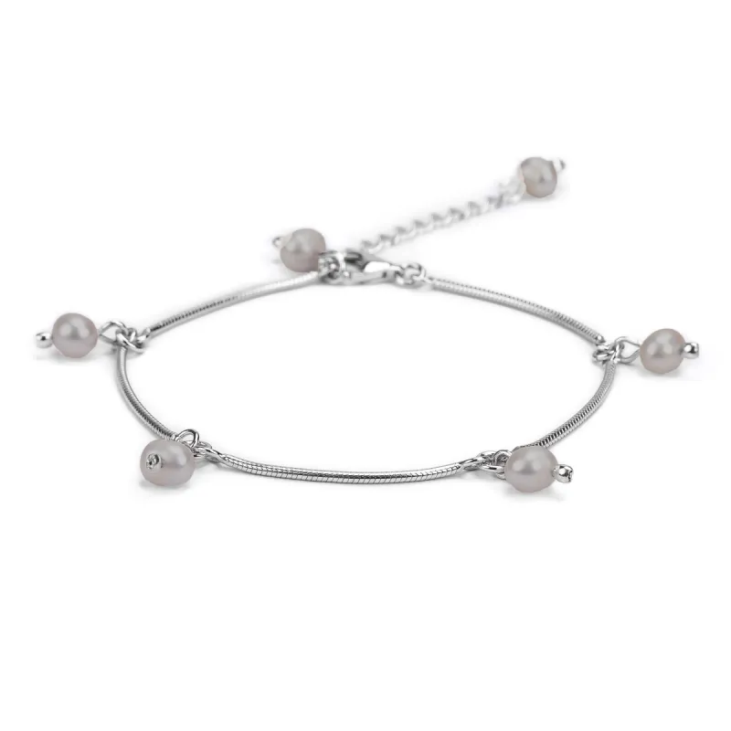 Droplet Bracelet in Silver and Pearl sold by Henryka