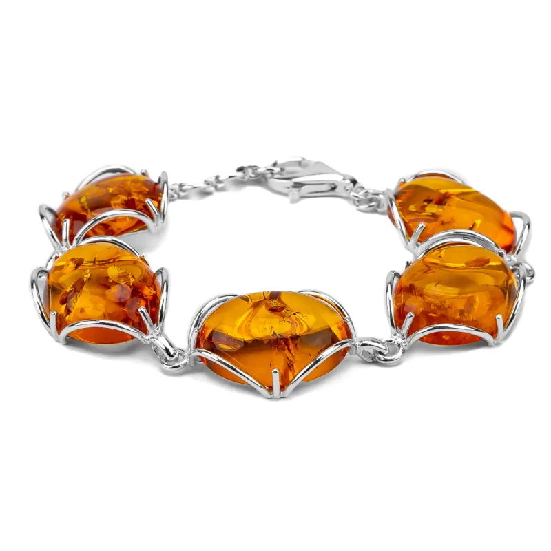 Handmade Statement Nugget Style Bracelet in Silver and Baltic Amber sold by Henryka