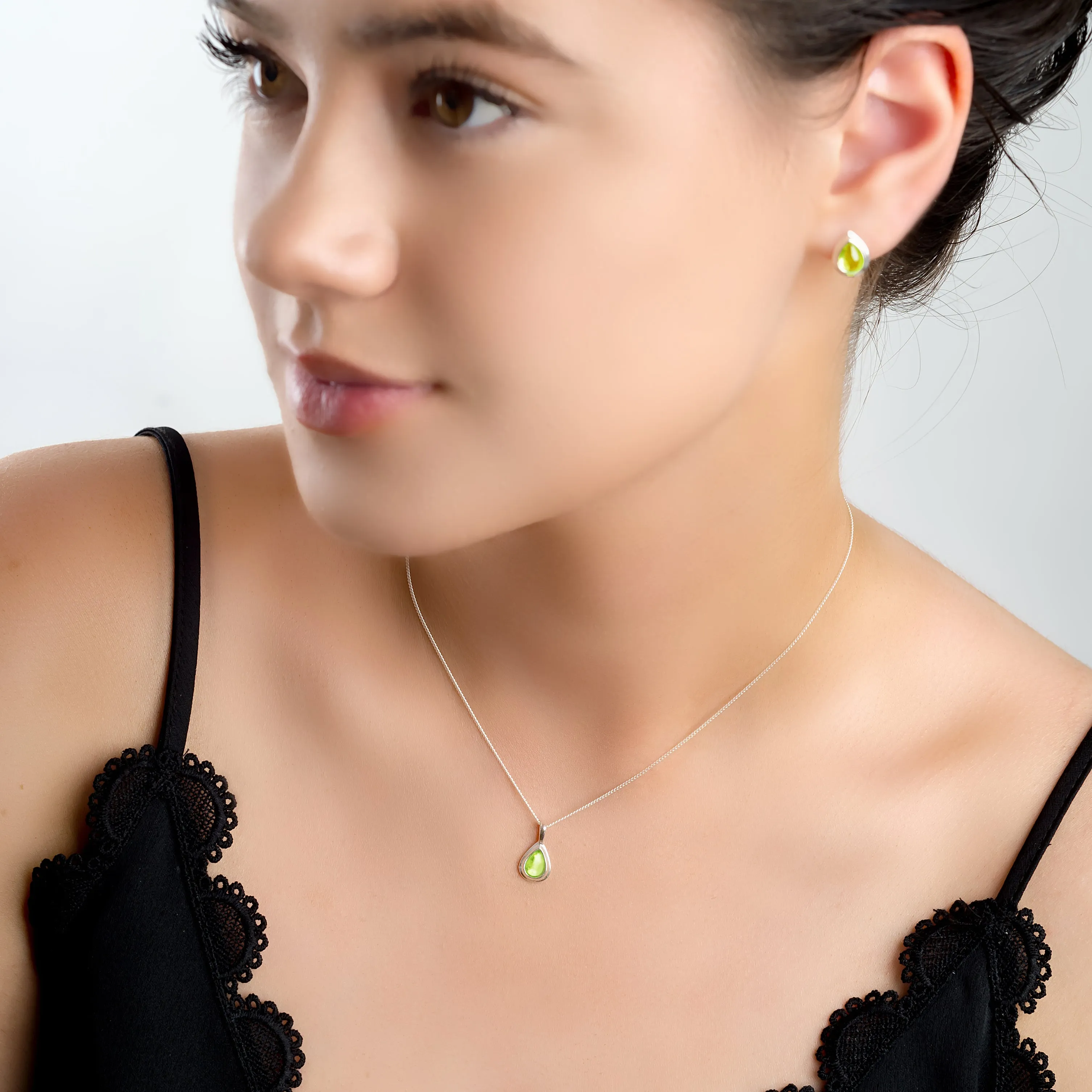 Classic Teardrop Stud Earrings in Silver and Peridot sold by Henryka product image thumbnail 4