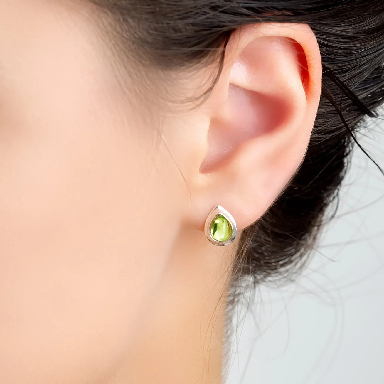 Classic Teardrop Stud Earrings in Silver and Peridot sold by Henryka product image thumbnail 2
