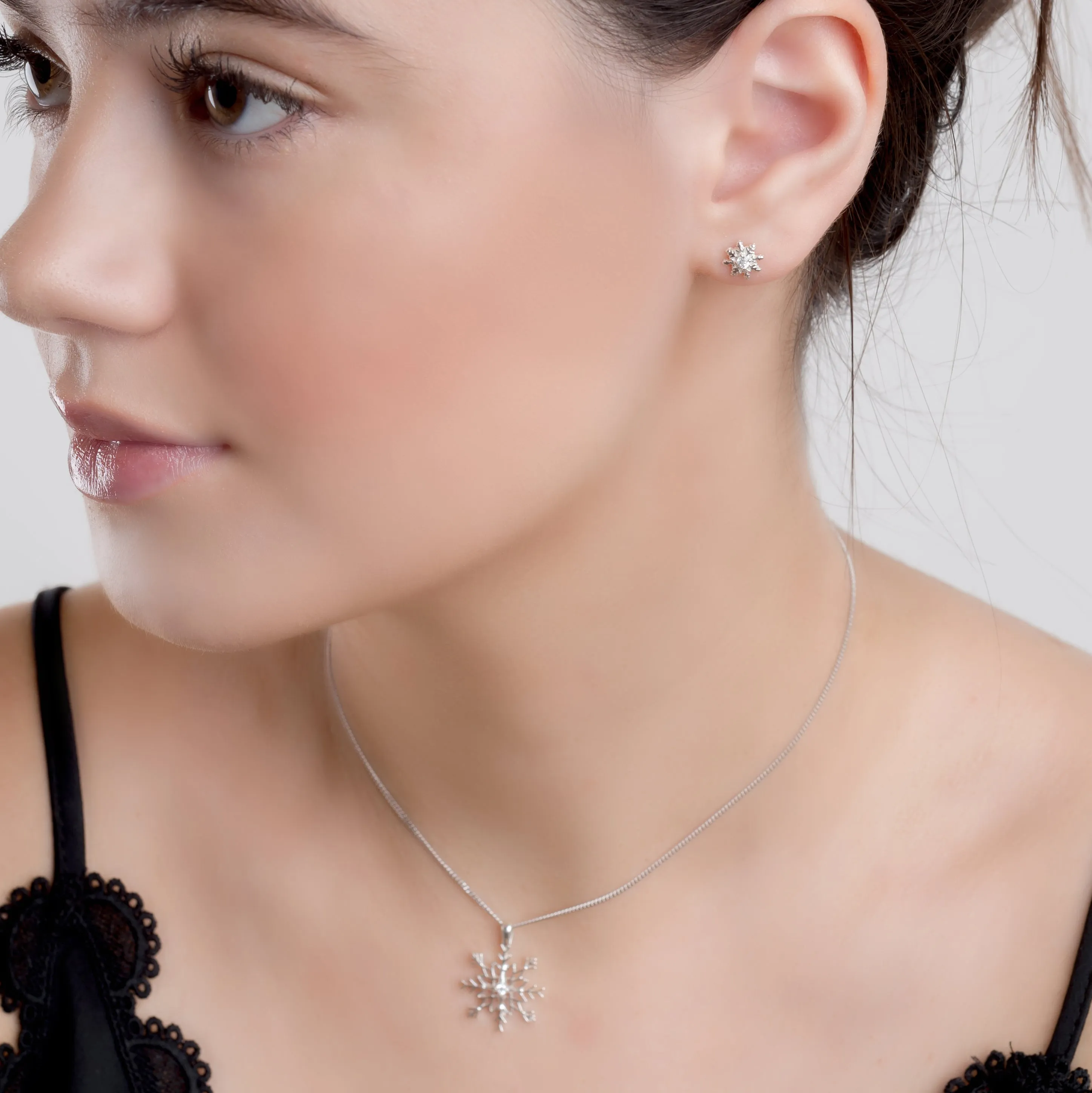 Snowflake Stud Earrings in Silver with Cubic Zirconia sold by Henryka product image thumbnail 3