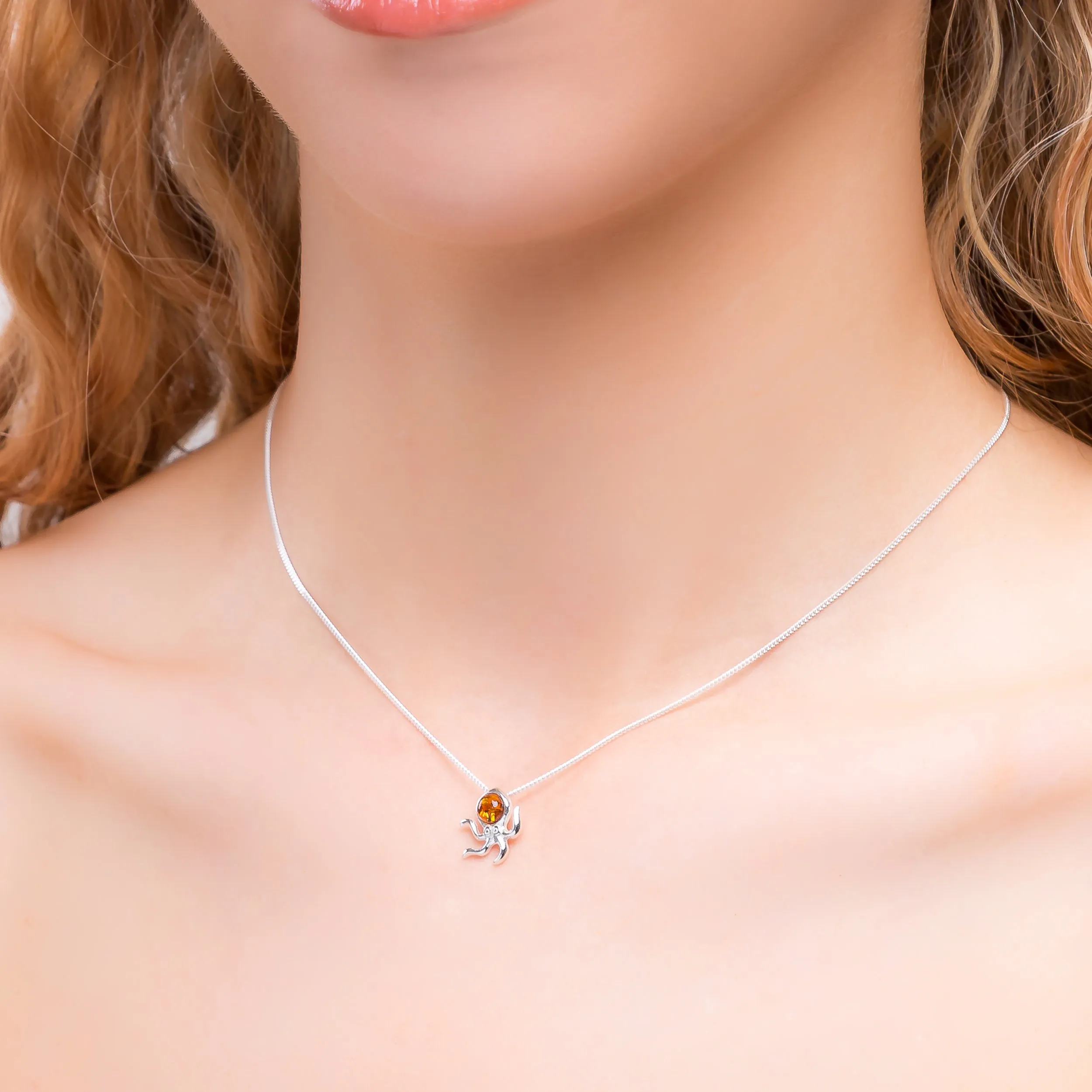 Miniature Octopus Necklace in Silver and Amber sold by Henryka product image thumbnail 2